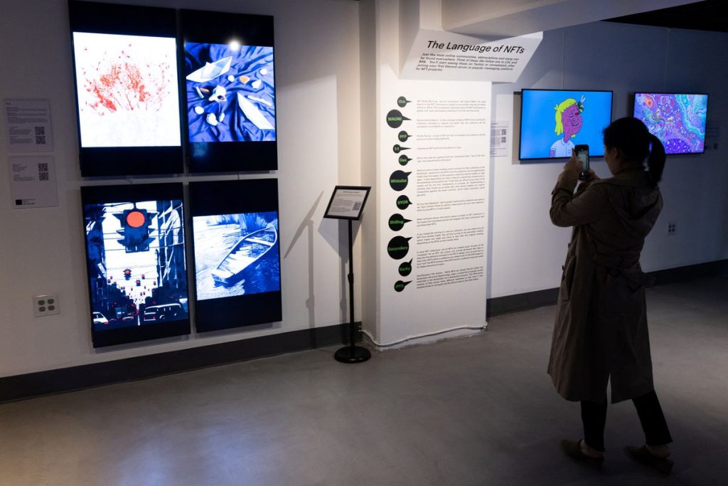 1-	“The Climate Conversation” exhibition at Seattle NFT Museum, the first permanent blockchain-based digital art museum in the world, Seattle, Washington, 2022.              Photo Credit: REUTERS/Matt Mills McKnight.